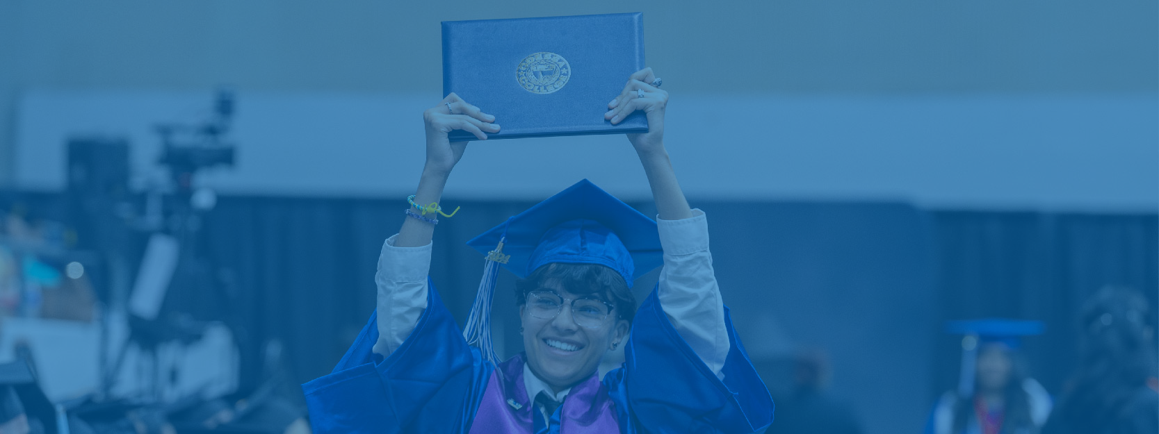 Graduation man with diploma in hands