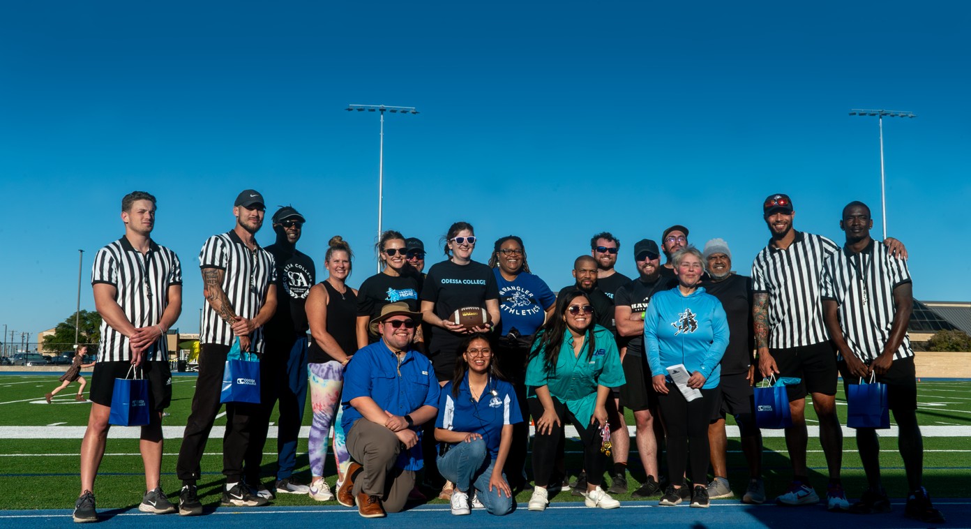 A group picture of students, staff, and community members