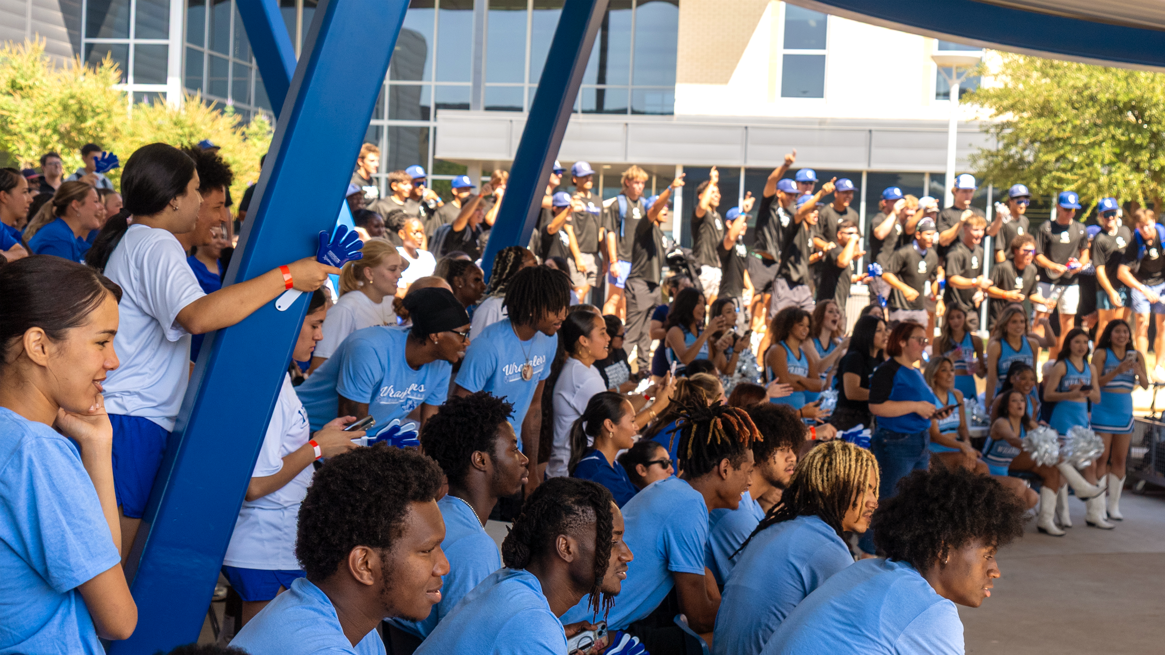 Students excited at campus event outside