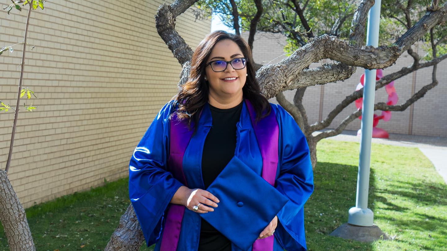 Daniela Rivera smiling with trees behind her