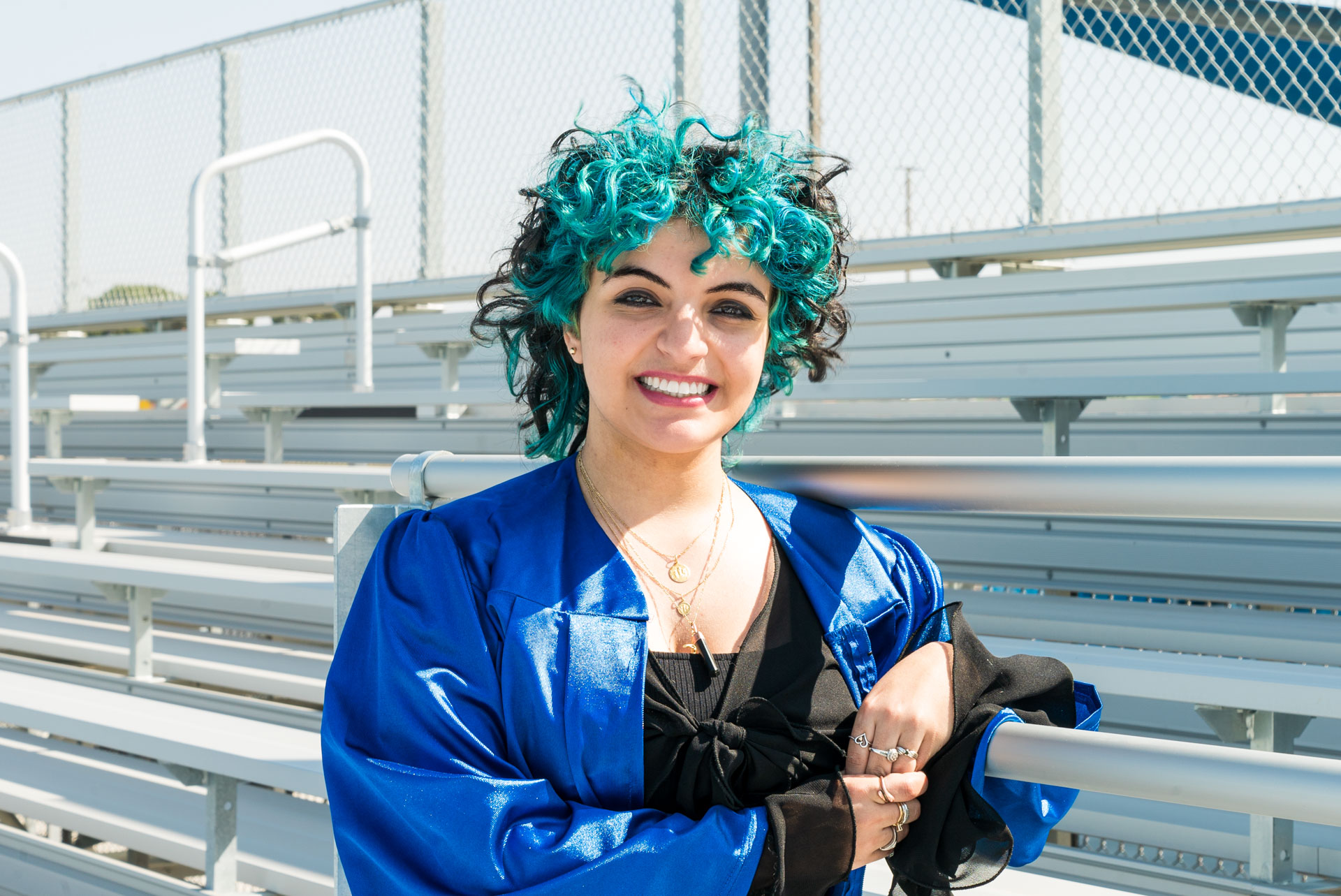 Andy Soto on football field stairs