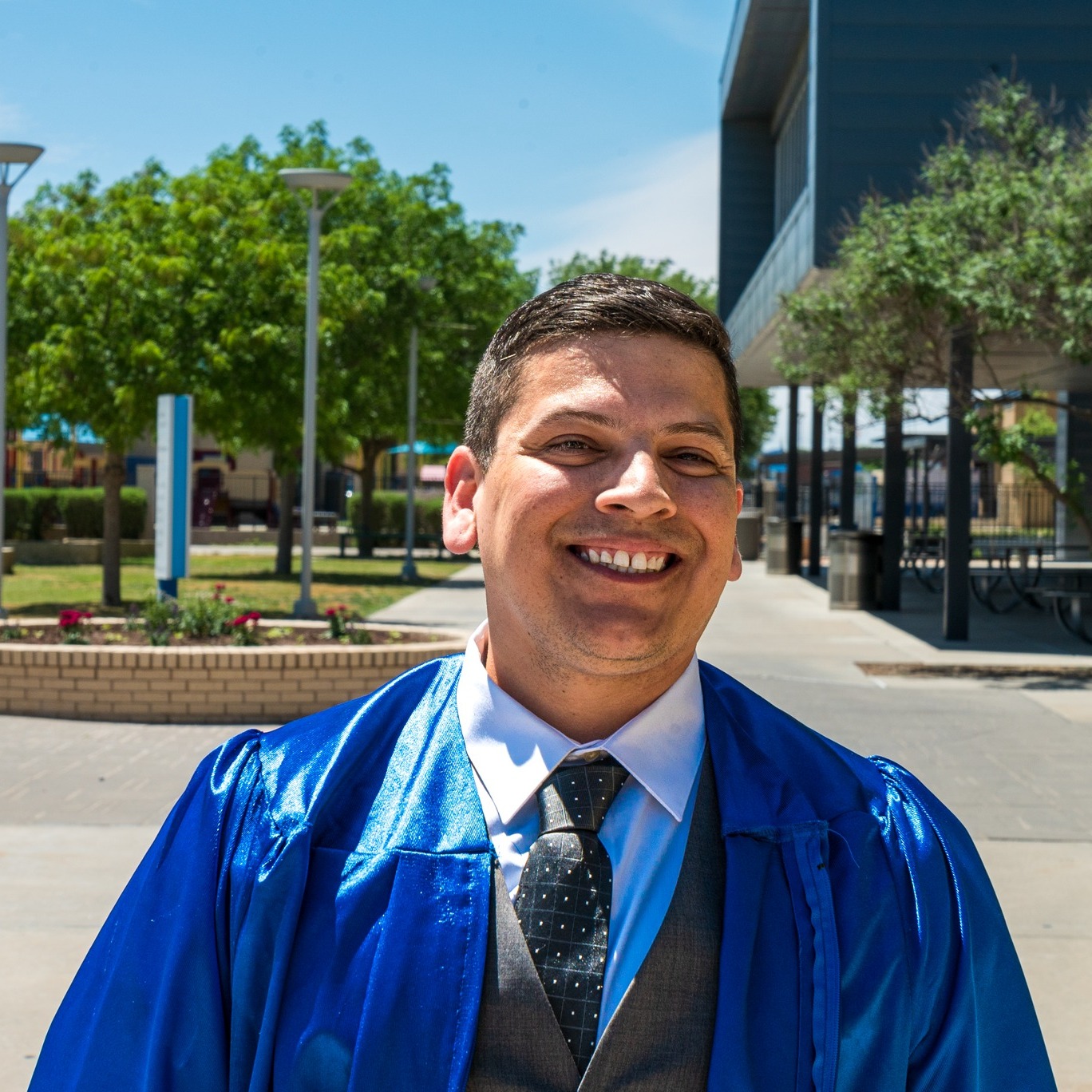 Fernando smiling in quad