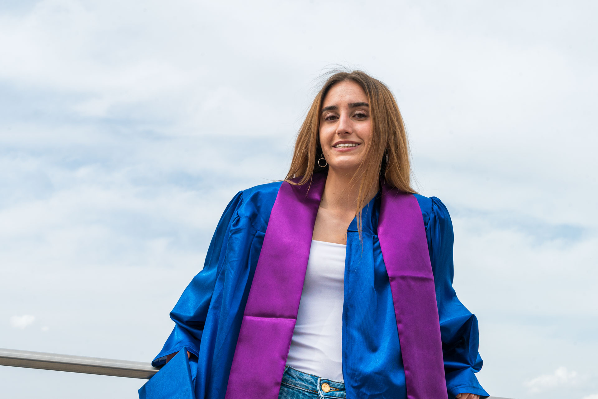 Ivana smiling by rail