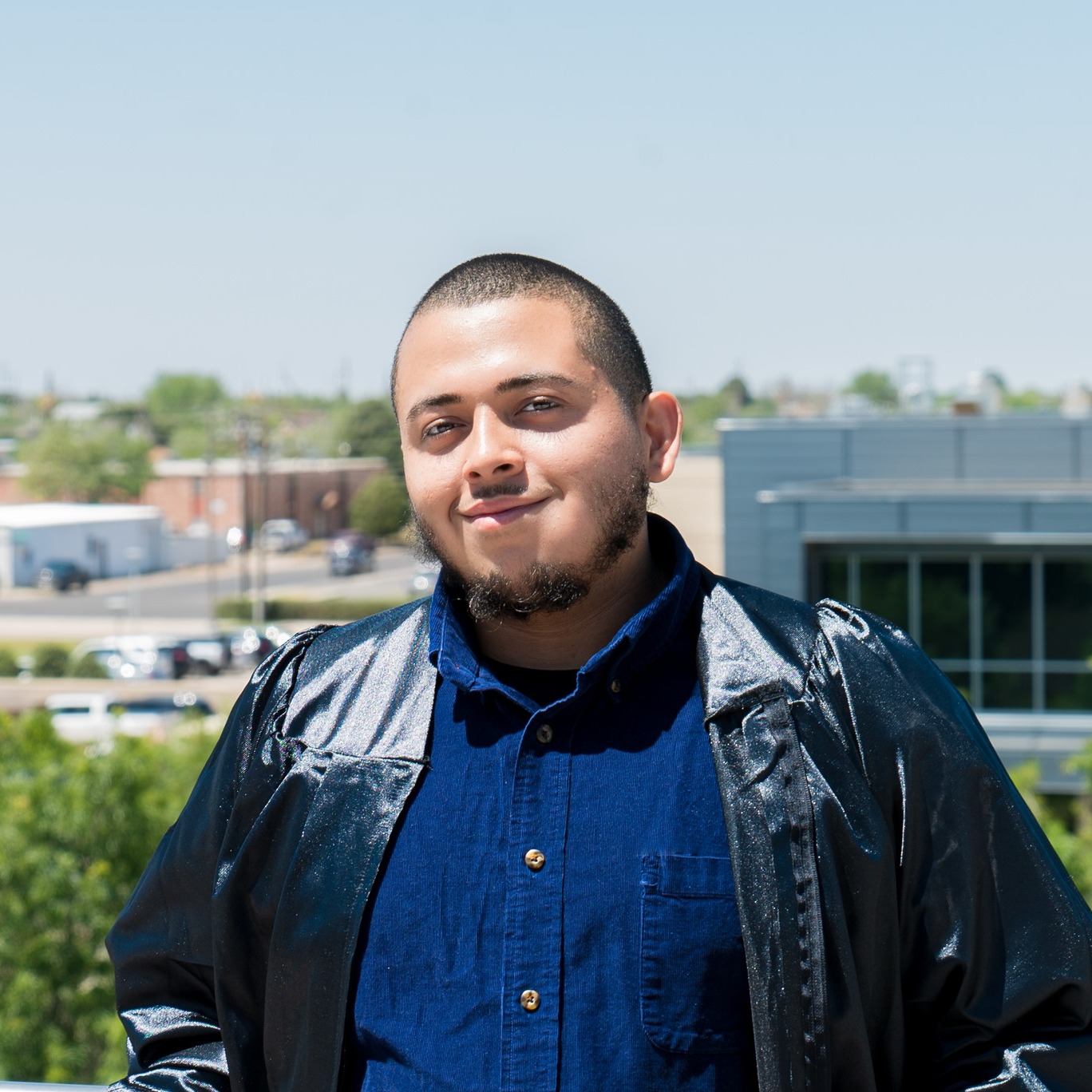 Jonathan smiling in balcony