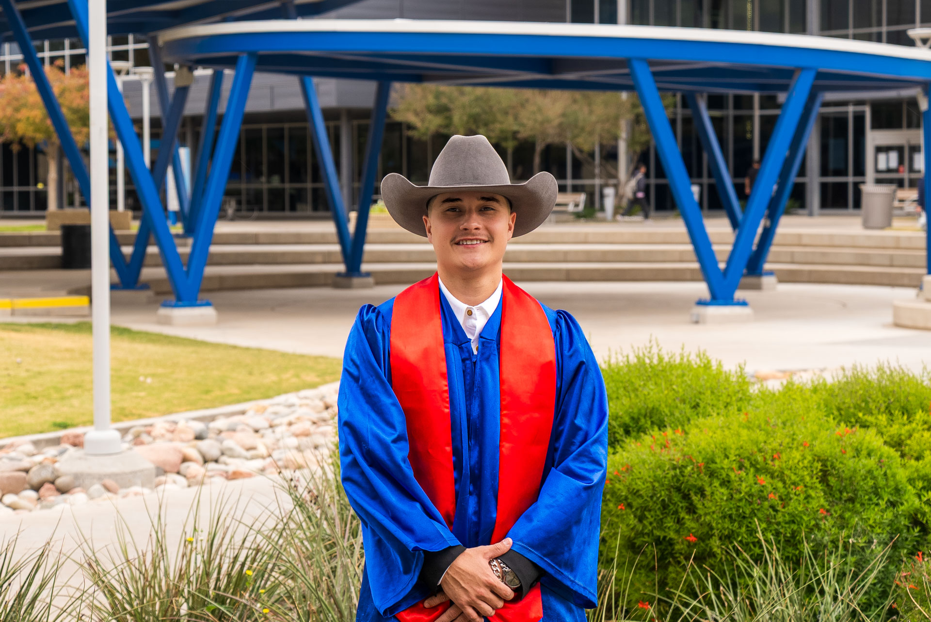 Aldo Cortez in front of amphitheater