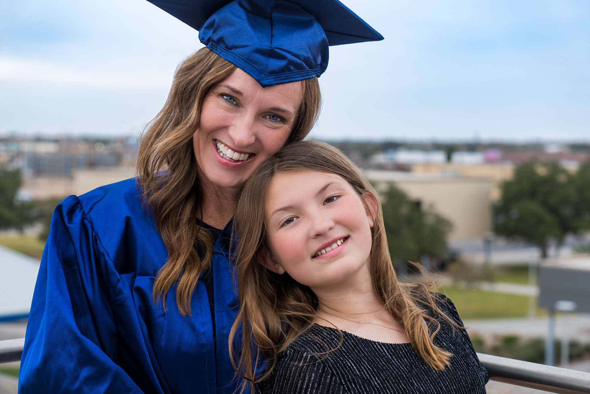 Candy Duke and daughter smiling