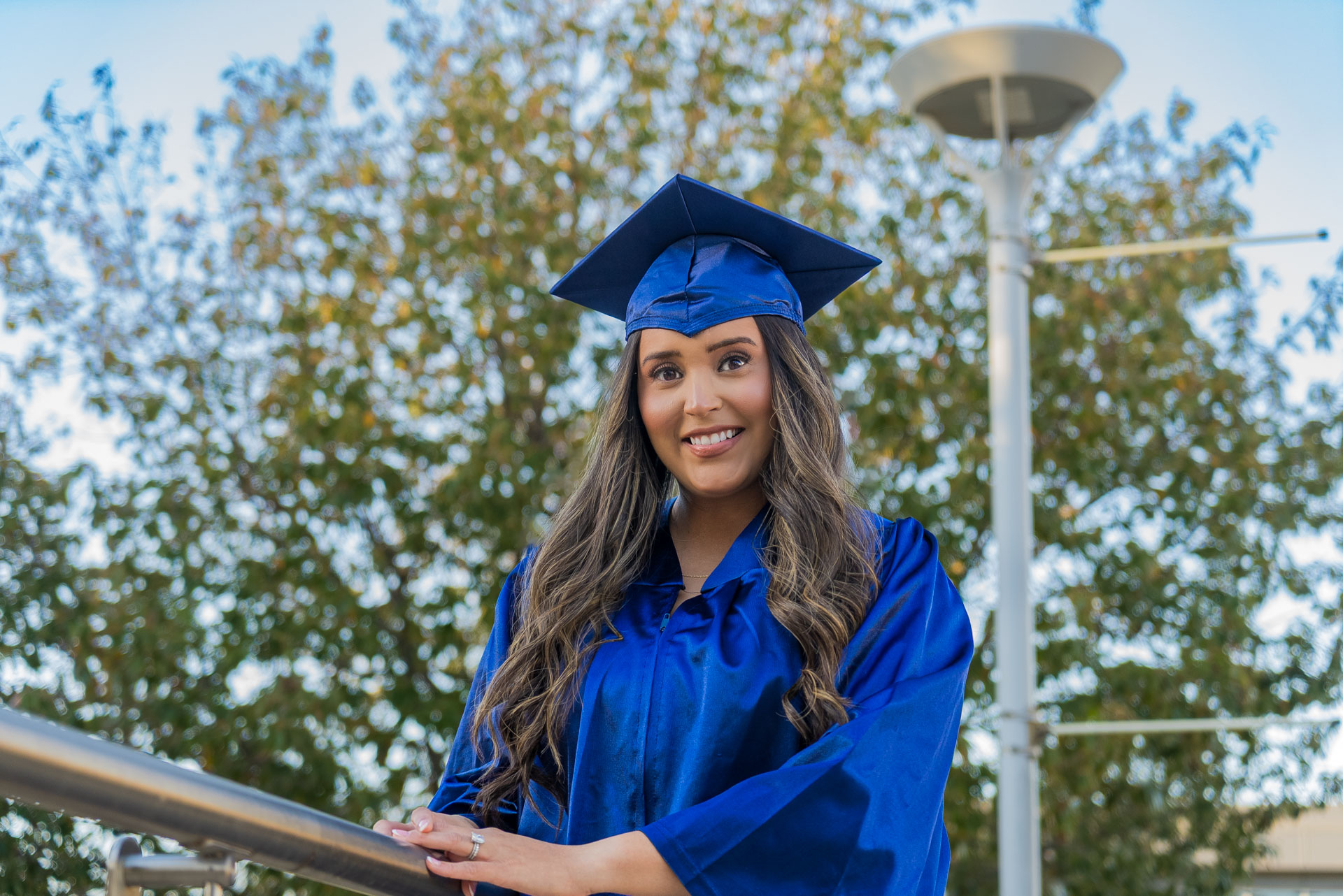 Dalia smiling by walking rail
