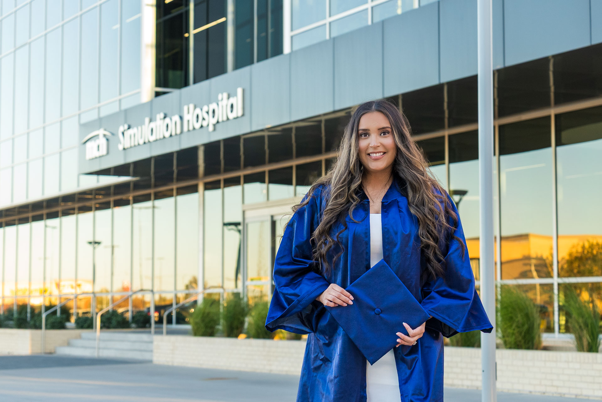Dalia Mendoza-Salgado in front of Sim Hospital
