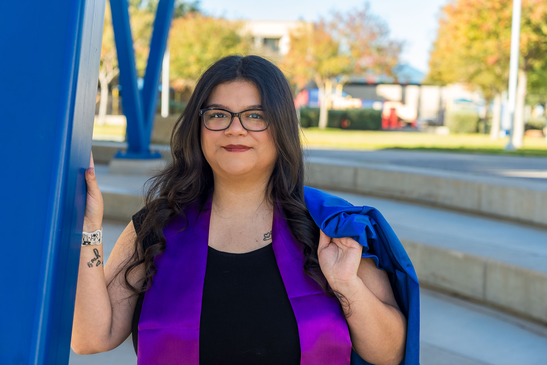 Evangelina with gown over her shoulder