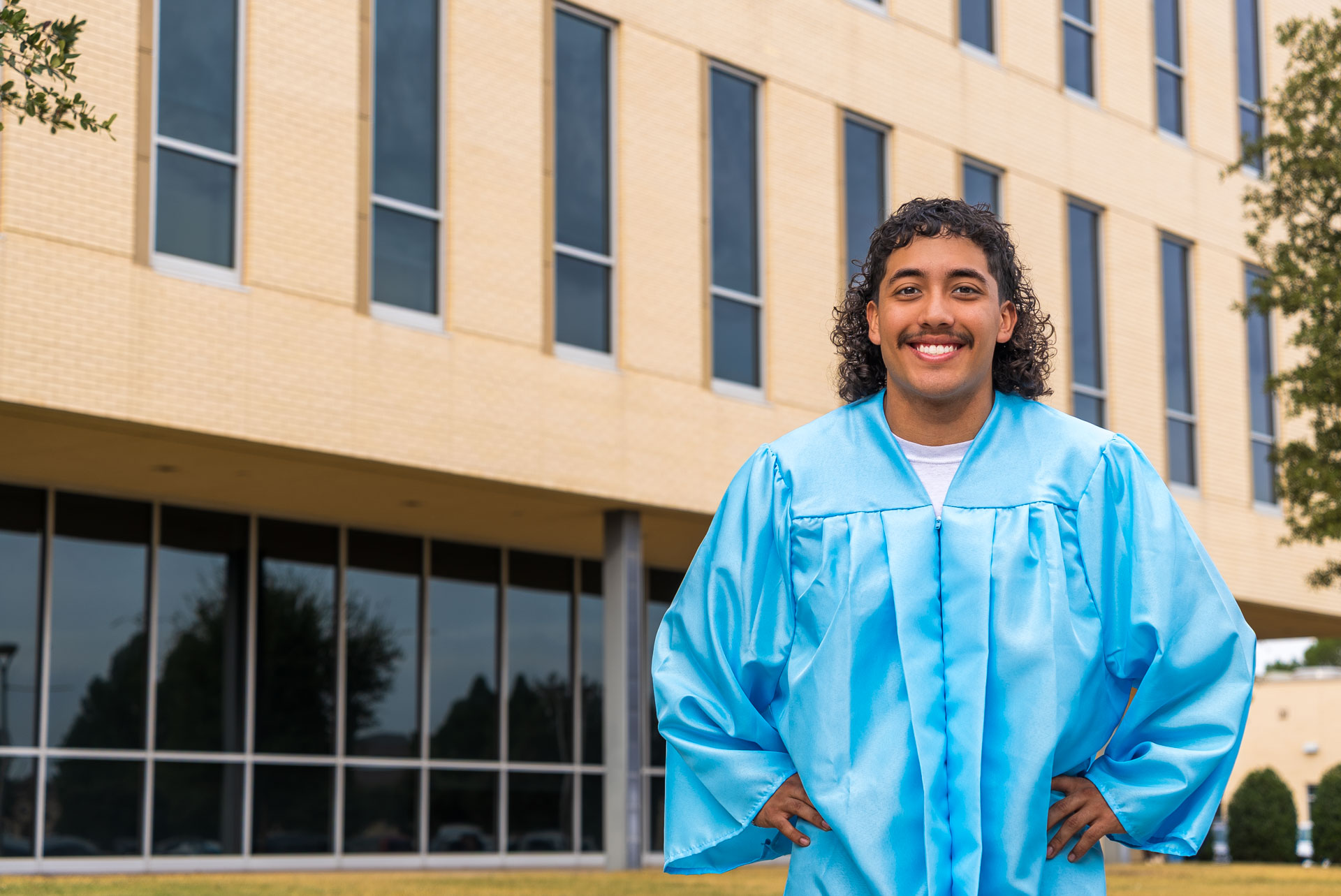Julien Martinez in front of a building