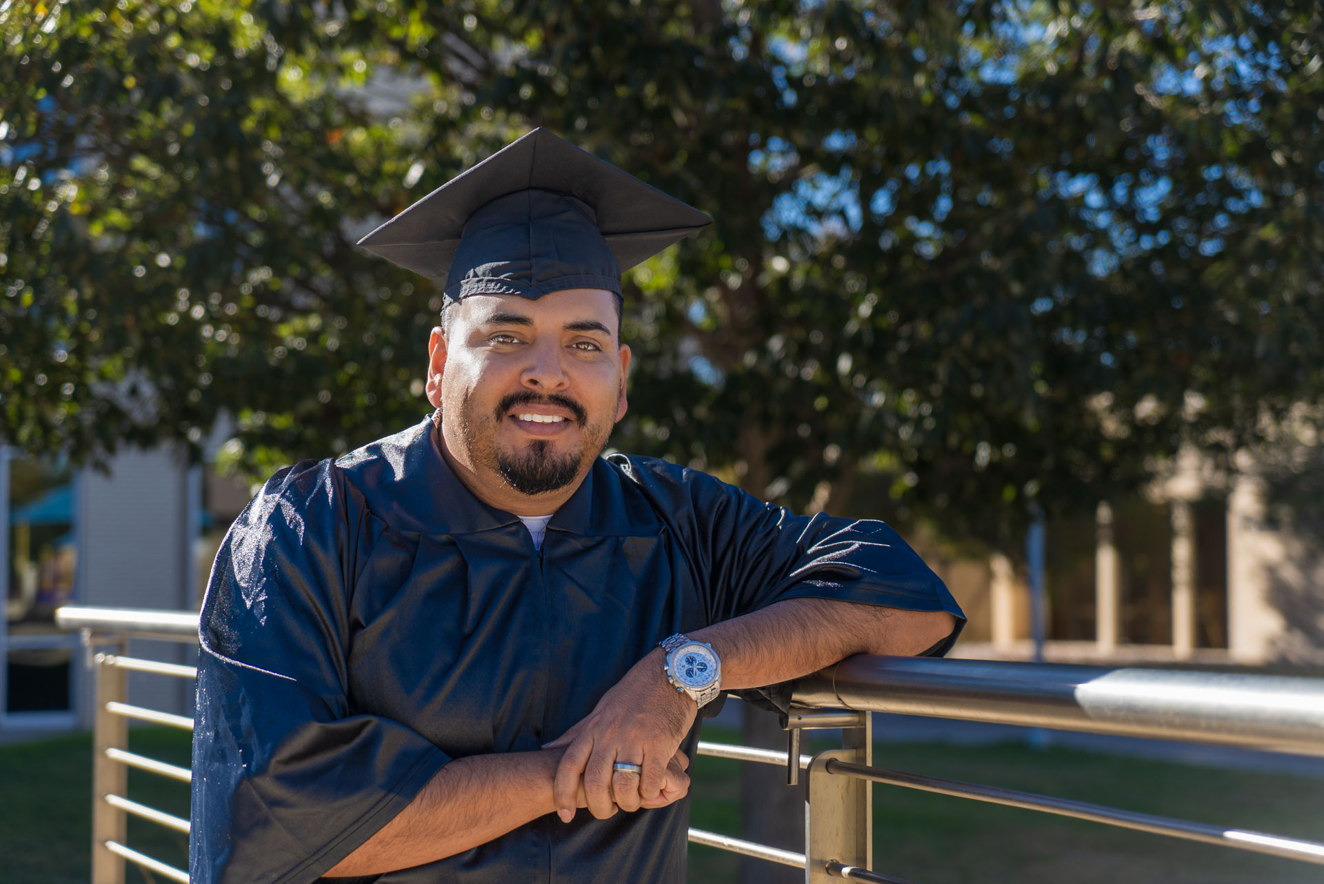 Luis Sigala posing next to a walking rail