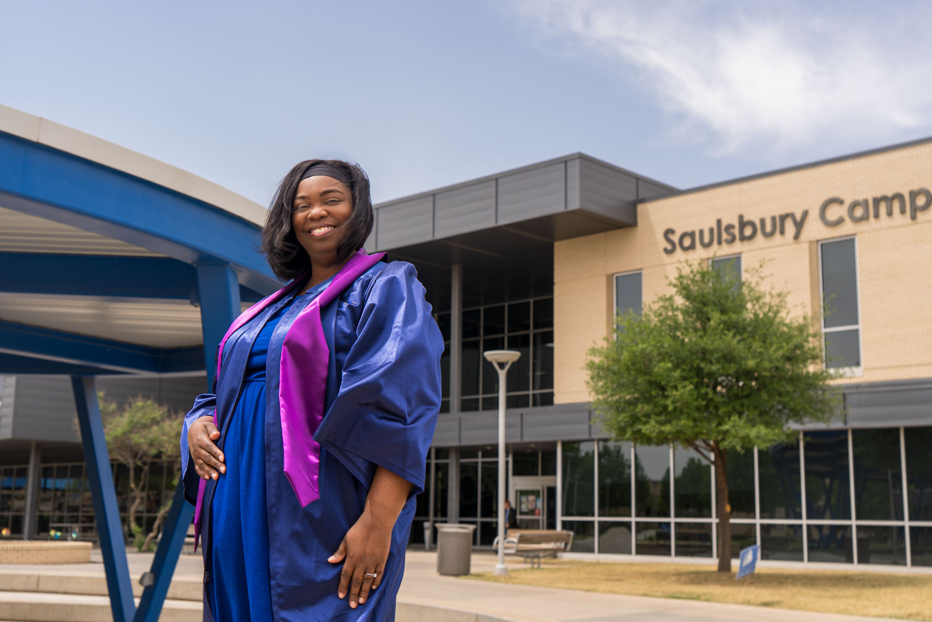 Ruth Watson in front of building