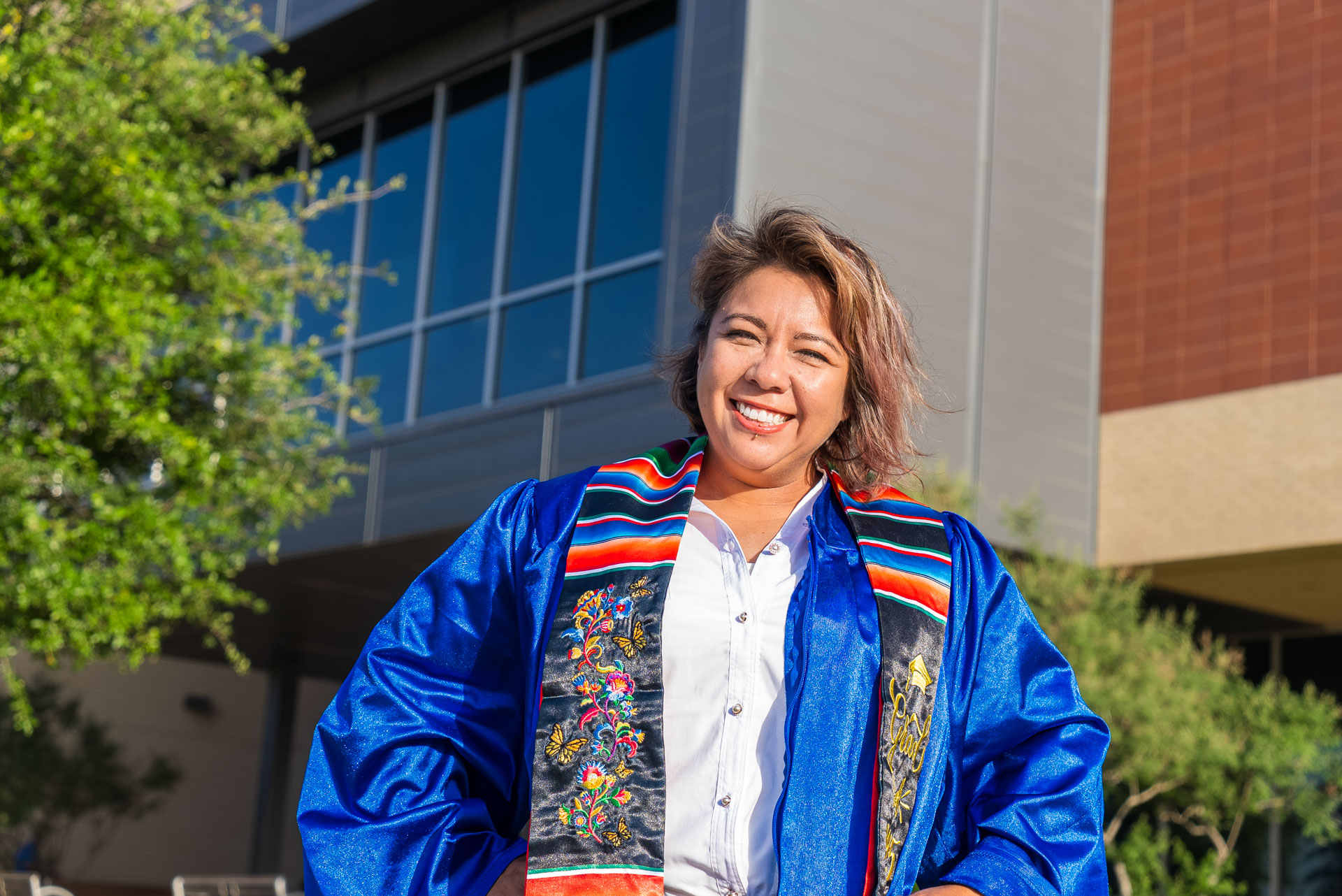 Yaribel Garcia smiling in front of building