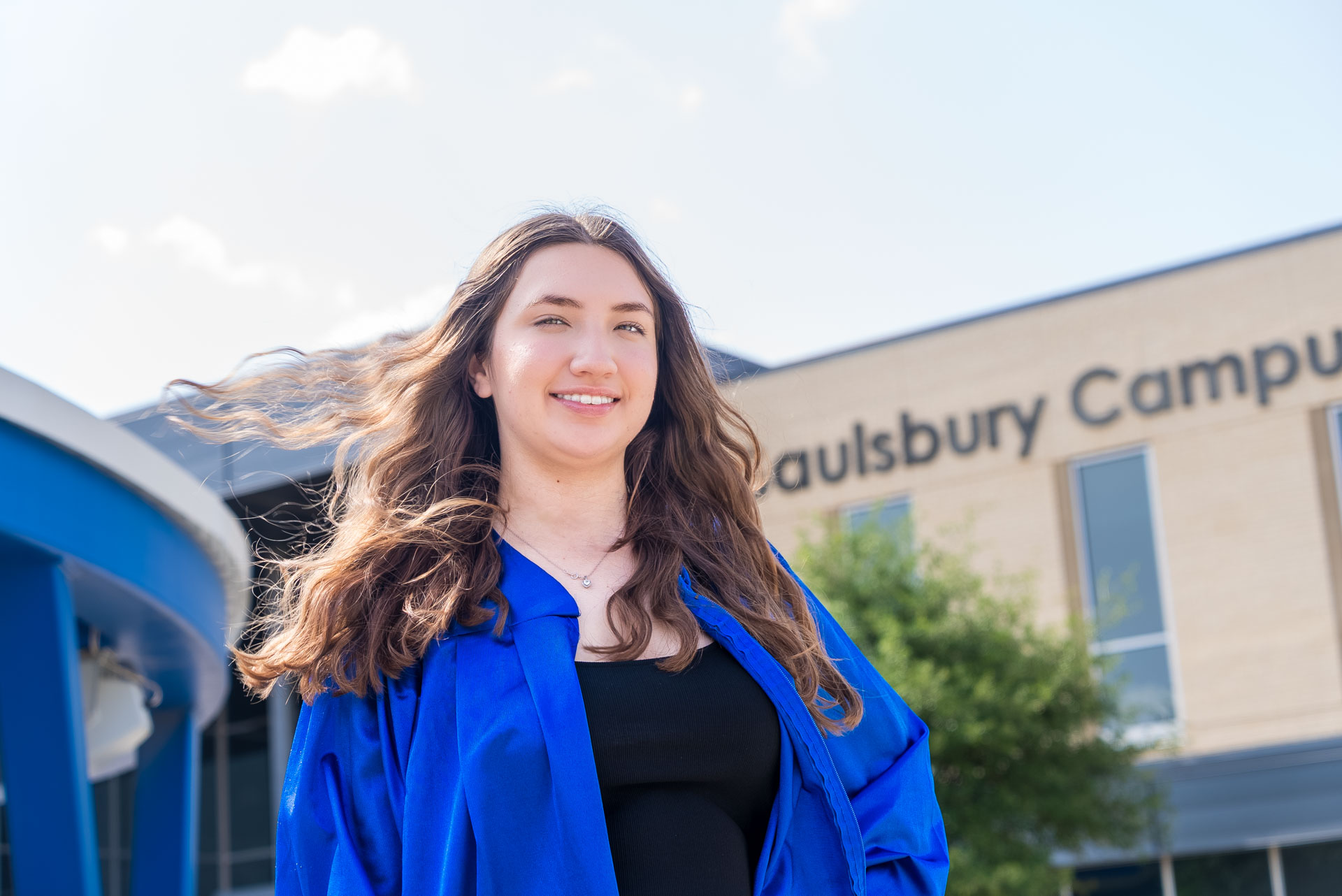 Aubree Lara in front of building